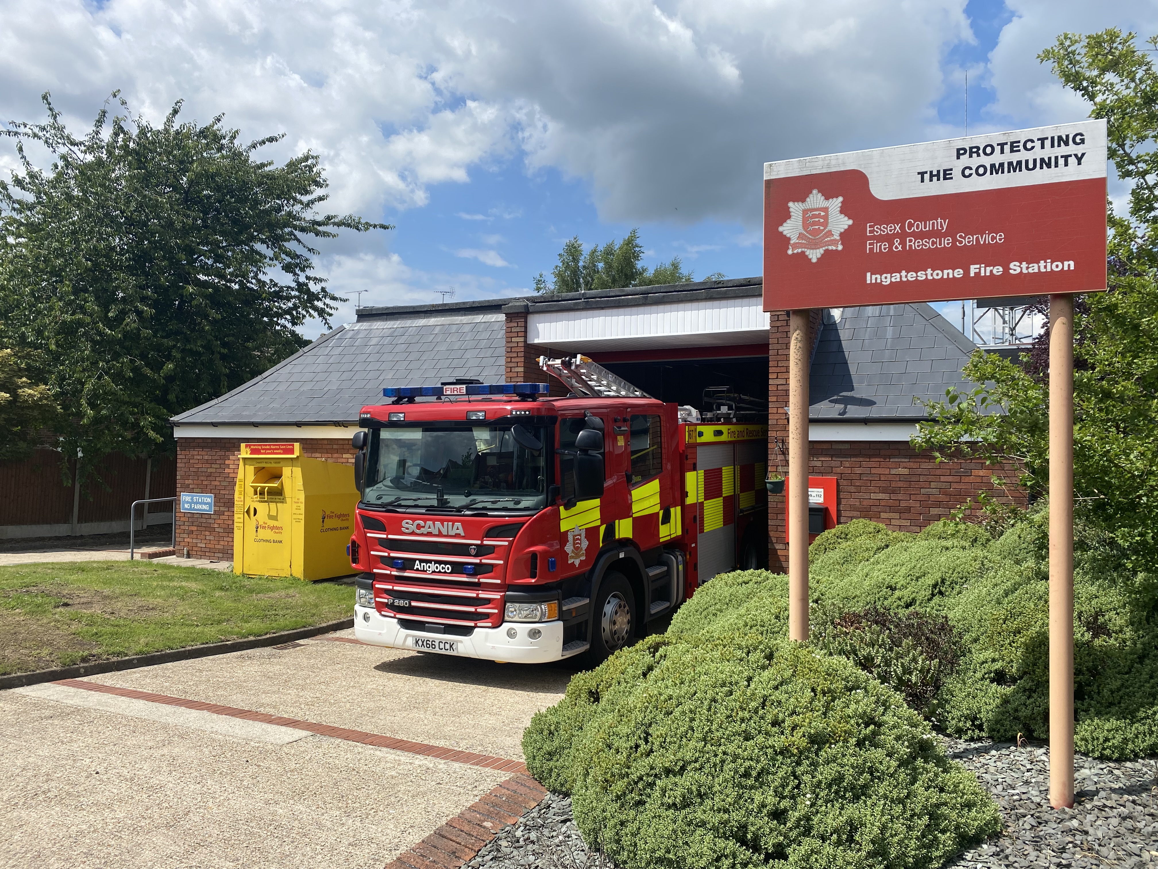 Ingatestone fire station, with a fire engine parked out the front and the sign at the front of the photo