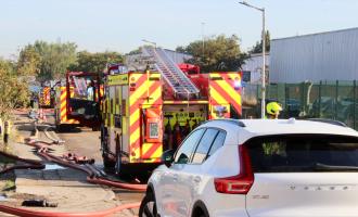 Fire engines parked on an industrial estate