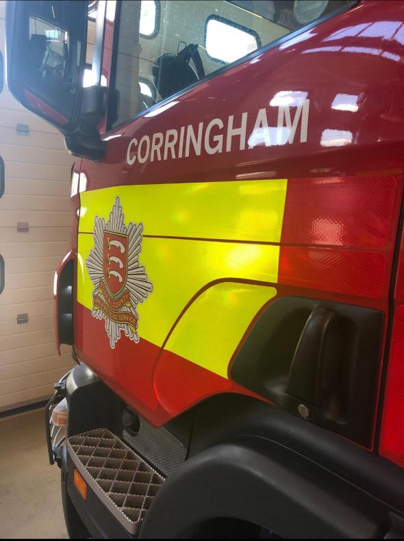 Side of the fire engine with "Corringham" written on the door
