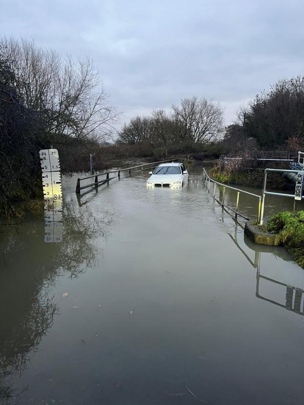 A car stuck in Buttsbury Wash