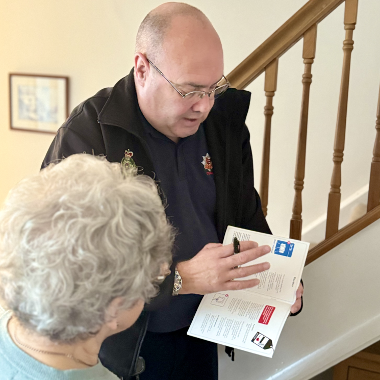Dean carrying out a Home Safety Visit with elderly resident