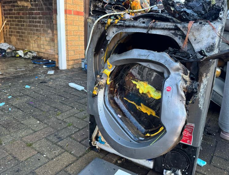 The burnt out tumble dryer