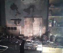 A smoke damaged kitchen following a hob fire