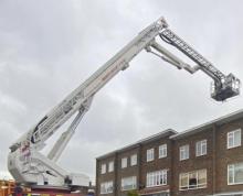 An Aerial Ladder Platform at the scene of a roof fire