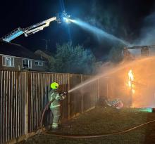 Firefighters tackling a house fire