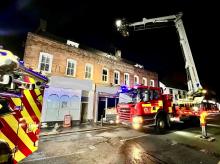 Fire in fish and chip shop - firefighters and fire engines