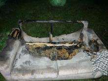 Burnt our sofa following candle fire